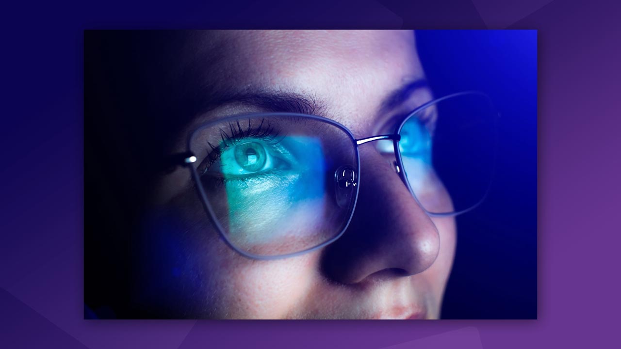 Blue light blocking glasses on a crypto trader’s desk