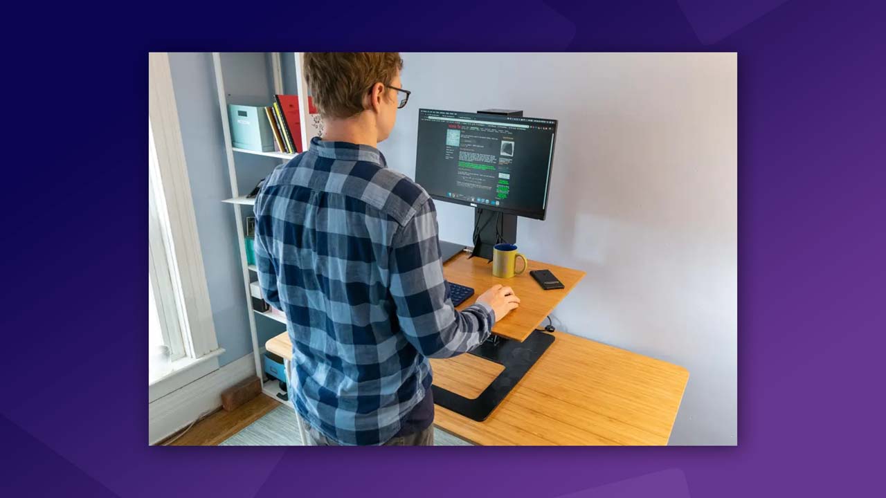 Standing desk converter in a dual-screen crypto workstation